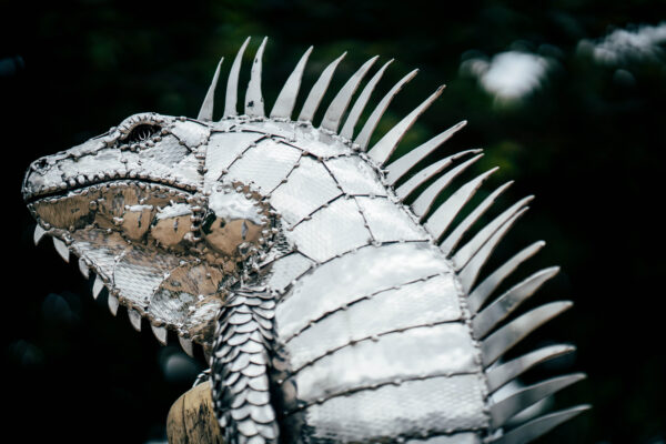 Metal statue of Iguaua head