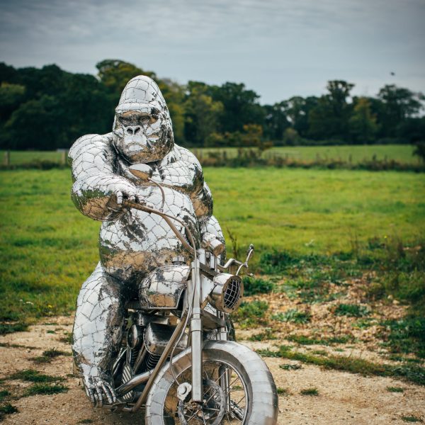 Gorilla sculpture on a motorbike