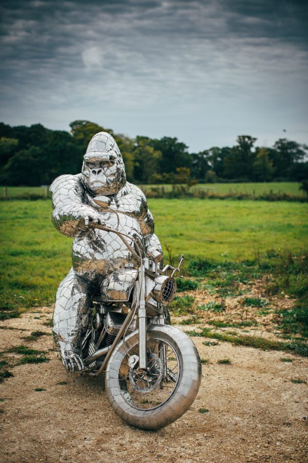 Gorilla sculpture on a motorbike