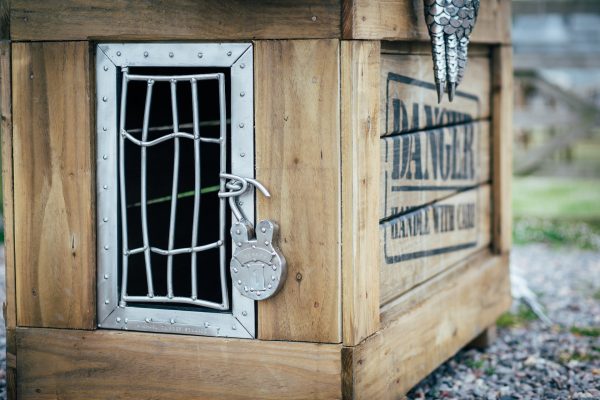 Crocodile on a crate garden sculpture