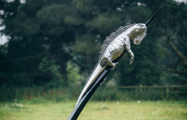 metal sculpture of a iguana