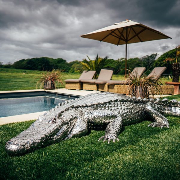 Crocodile sculpture in metal