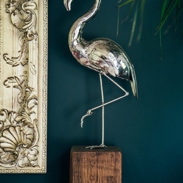 Interior accent: polished stainless steel flamingo sculpture.