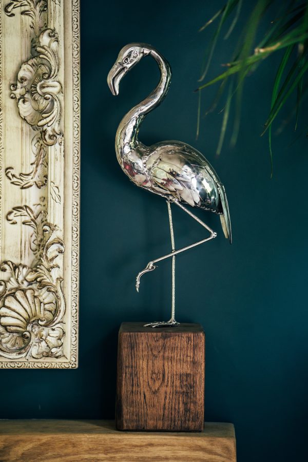 Interior accent: polished stainless steel flamingo sculpture.