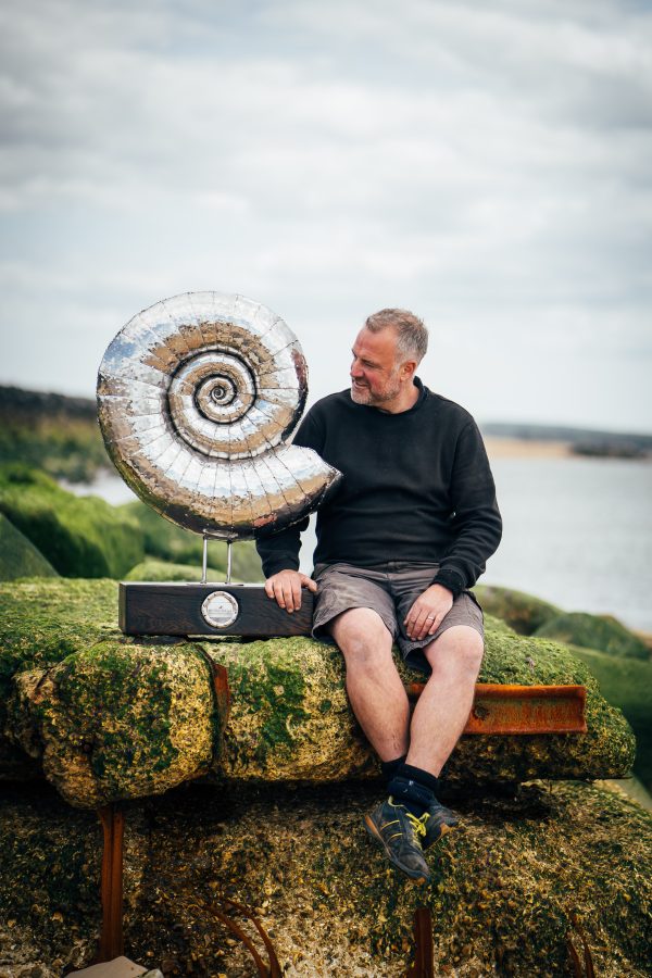 Michael Turner with his Ammonite sculpture