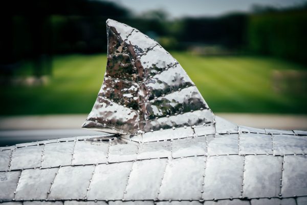 Stainless steel shark fin, sculpture by Michael Turner